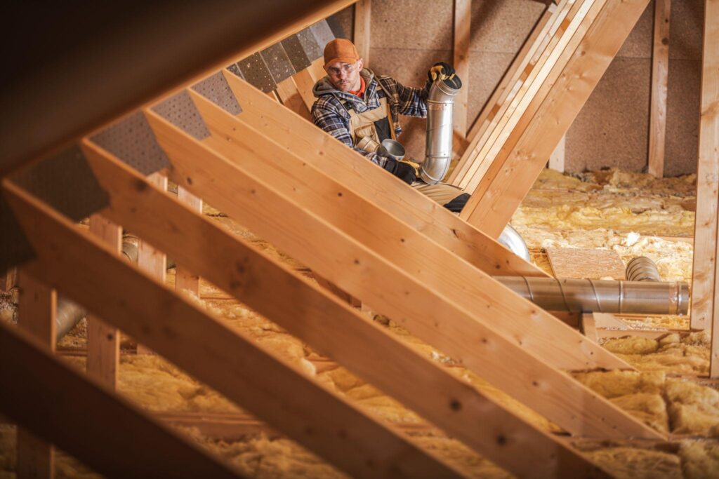 attic-with-insulation | Guardian Roofing, Gutters & Insulation Technician in insulated attic