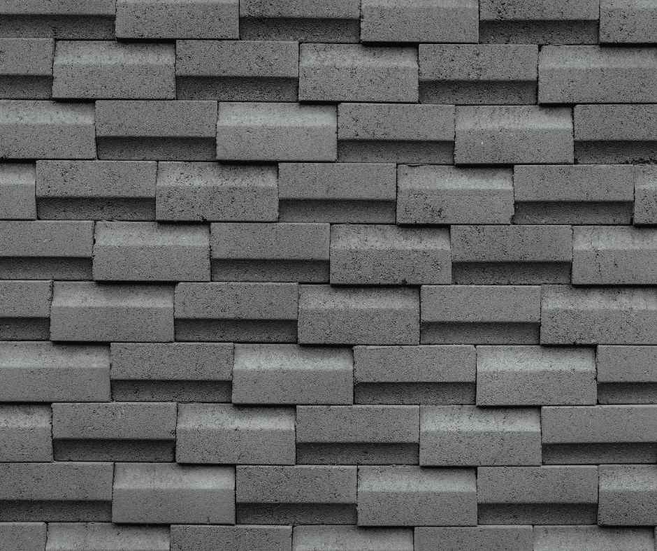 Patterned asphalt roof shingles